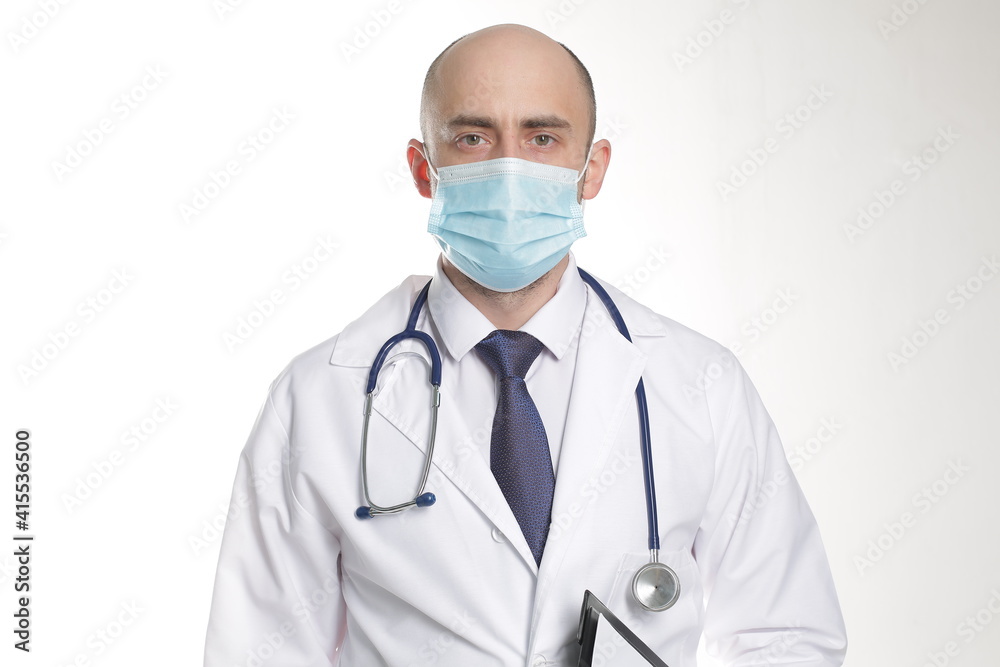 Doctor in Protective Mask with stethoscope in hospital Doctor in Protective Mask with stethoscope in hospital