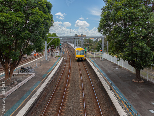 Photography Commuter train approaching train station in Sydney NSW Australia