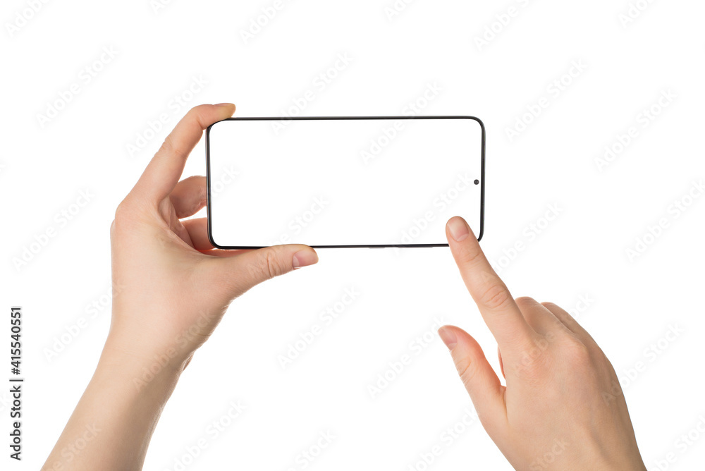Cropped close up view photo picture of female woman's hands holding telephone in horizontal position touching screen isolated white backdrop
