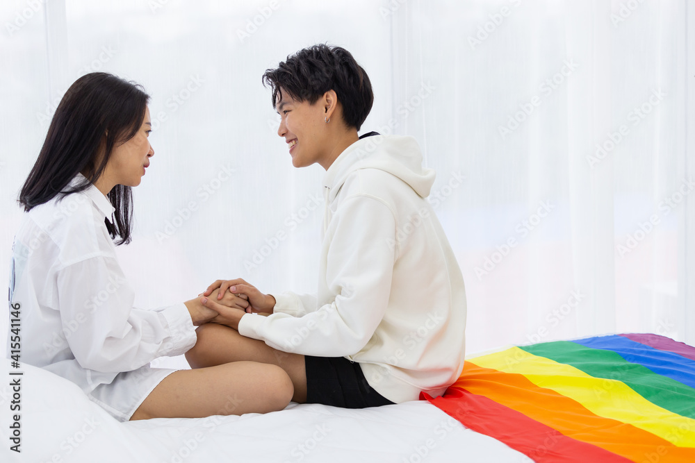 Fototapeta premium Lesbian couples live happily in a private room, selective focus.