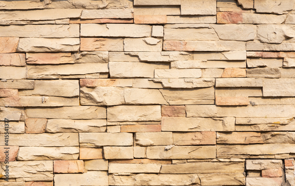 Yellow sand stone brick wall with natural texture in hi resolution, for background.