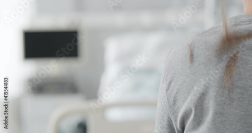 Cropped shot of patient having hair shaven in hospital before surgery