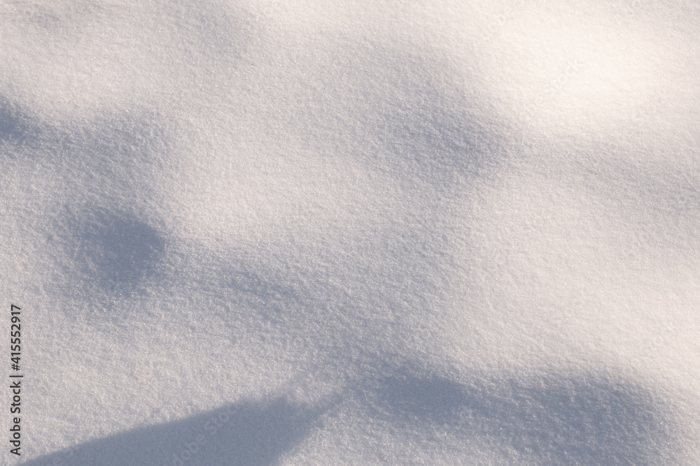 White background with fresh snow and shadows