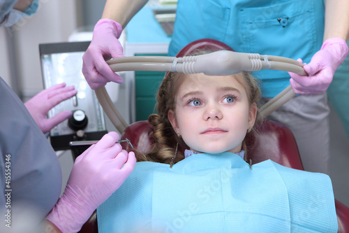 Dental treatment in a child with the use of nitrous oxide. Relaxation of the patient before surgical or dental procedures. Children's modern dentistry. The concept of healthcare. Top view.
