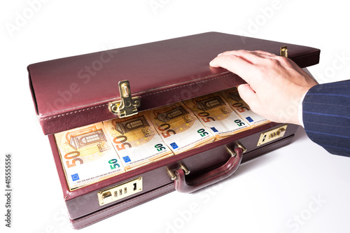 24-hour half-open briefcase full of euro banknotes photo