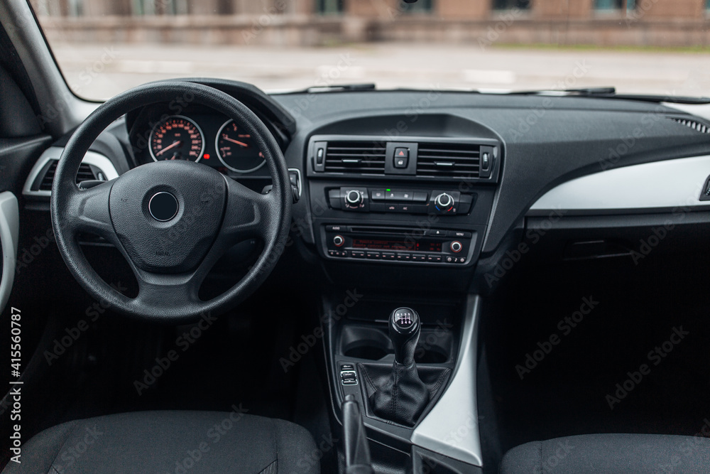 Modern car interior with the leather panel, and dashboard Modern car interior with the leather panel, and dashboard