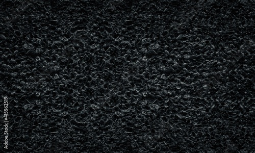 Billede på lærred Black rough cement mortar with pebbles texture