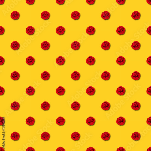 Red rose seamless pattern on yellow background