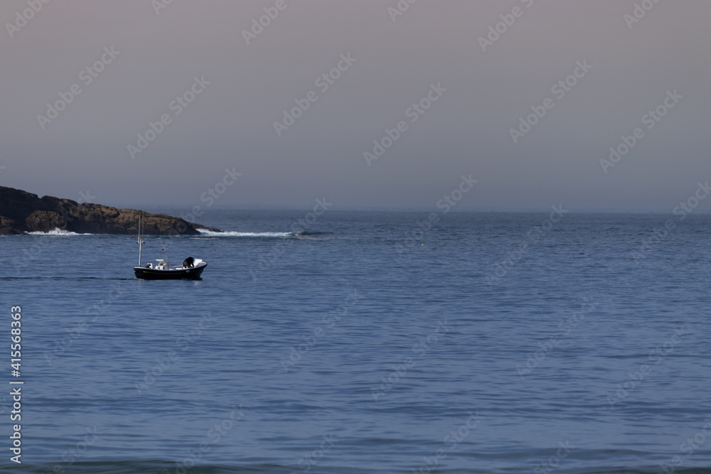 A small fishing boat at sea