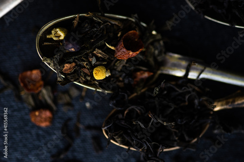 Variety of tea leaves in spoon