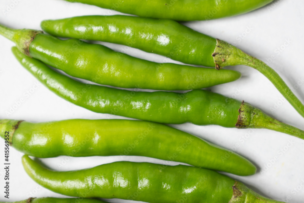green chili pepper isolated on a white background