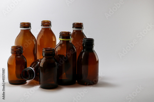Several empty bottles of  medicine 