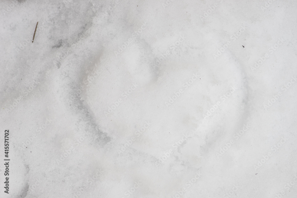 Heart shaped form on snow