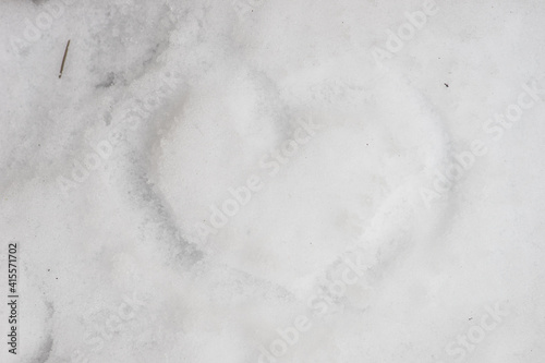Heart shaped form on snow