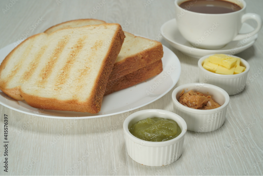 Morning breakfast toasted bread butter kaya peanut with coffee Morning breakfast toasted bread butter kaya peanut with coffee