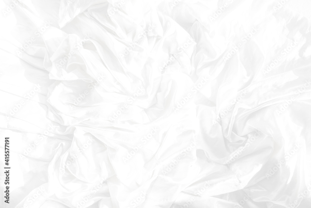 Top view Abstract White cloth background with soft waves.Wave and curve overlapping with different shadow of color,white fabric, crumpled fabric. Top view Abstract White cloth background with soft waves.Wave and curve overlapping with different shadow of color,white fabric, crumpled fabric.
