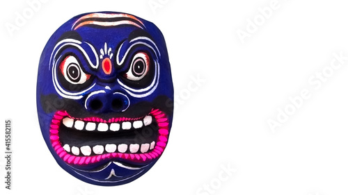 Chhau (or Chhou) mask displayed in a handicraft fair at West Bengal. Dancer uses this mask while performing at traditional tribal Chhou dance festival in India. White background.