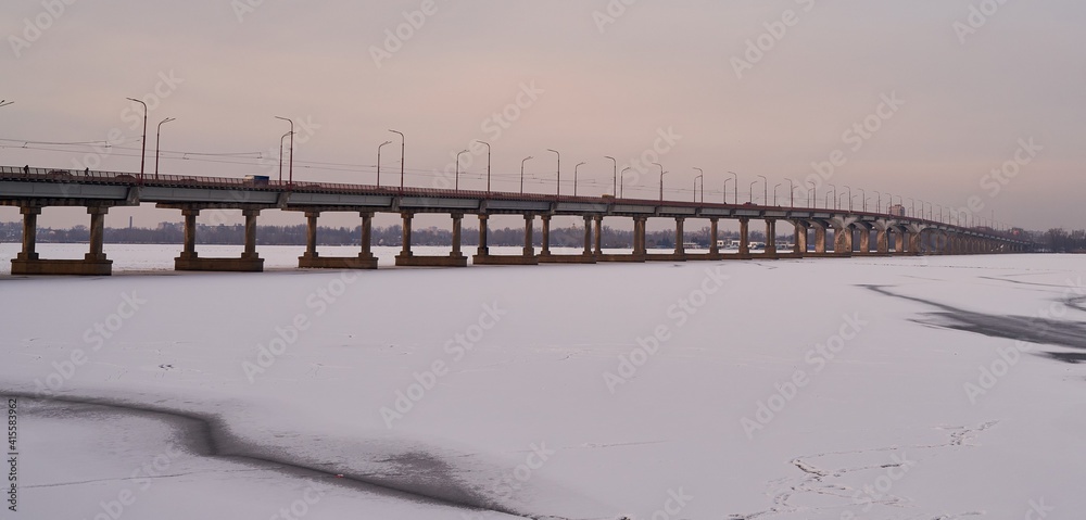 bridge over the frozen Dnieper river