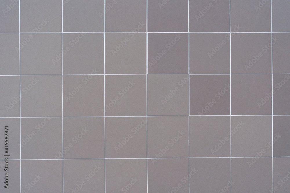 background gray ceramic tiles laying without pattern wall
