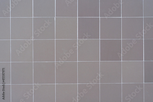 background gray ceramic tiles laying without pattern wall