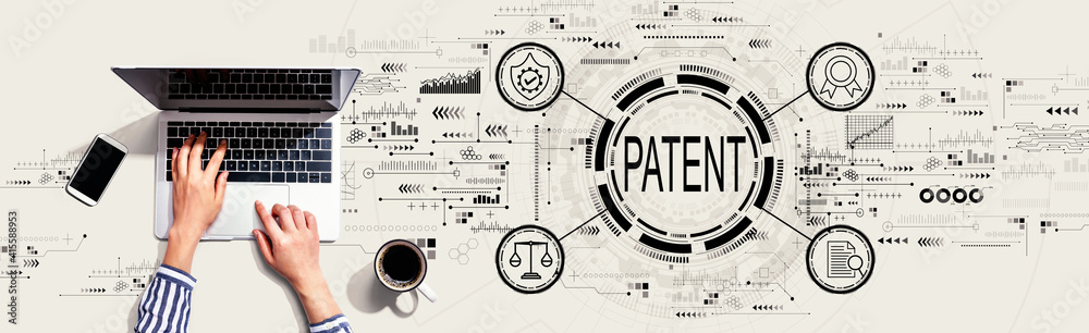 Patent concept with person using a laptop computer Patent concept with person using a laptop computer