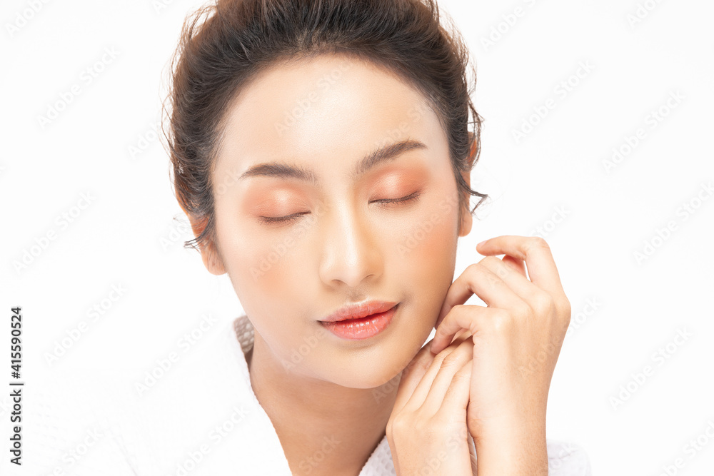 Beautiful Asian young woman close her eyes touching soft cheek smile with clean and fresh skin Happiness and cheerful with positive emotional,isolated on white background,Beauty and Cosmetics Concept Beautiful Asian young woman close her eyes touching soft cheek smile with clean and fresh skin Happiness and cheerful with positive emotional,isolated on white background,Beauty and Cosmetics Concept