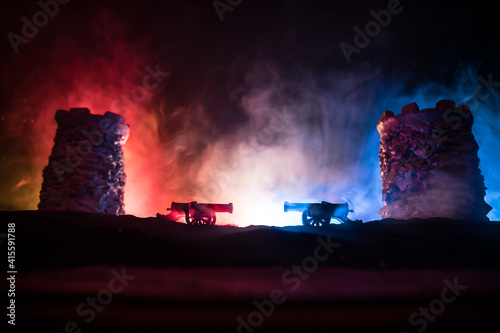 Medieval battle scene. Silhouettes of figures as separate objects, fight between warriors at night. Creative artwork decoration. Foggy background.