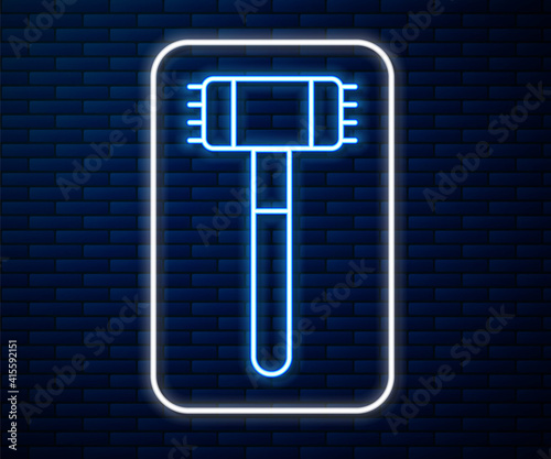 Glowing neon line Kitchen hammer icon isolated on brick wall background. Meat hammer. Vector.