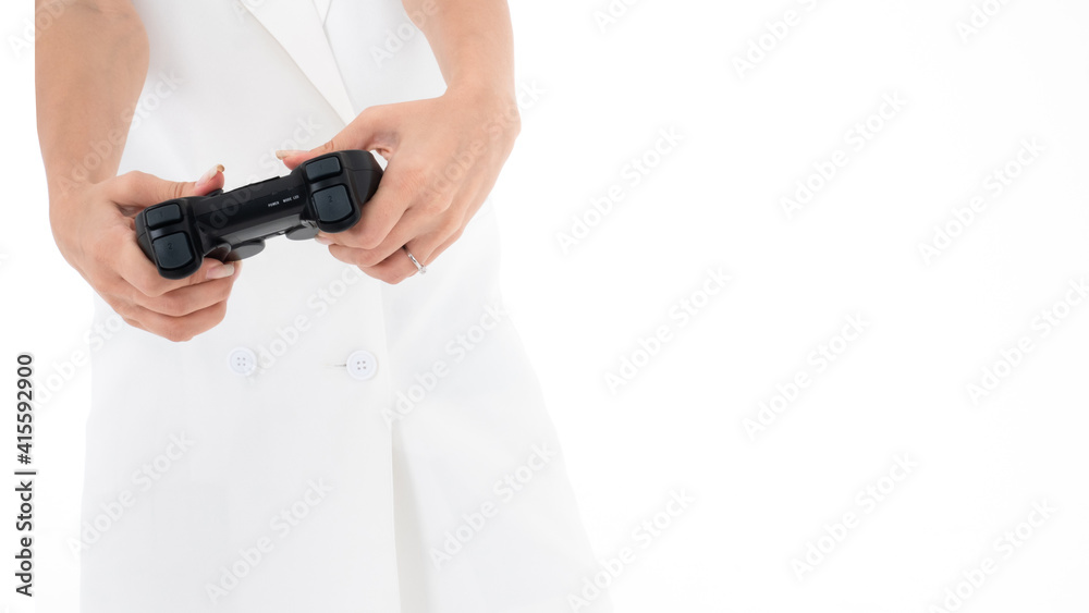 Close up gamer hand press on joystick controller when she playing video game and competition with her online friend challenge portrait isolated on white background Close up gamer hand press on joystick controller when she playing video game and competition with her online friend challenge portrait isolated on white background