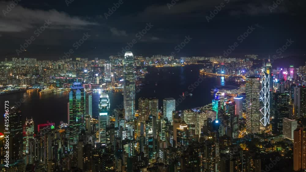 Night timelapse view of Hong Kong cityscape and Victoria Harbour in Hong Kong, China. Night timelapse view of Hong Kong cityscape and Victoria Harbour in Hong Kong, China.
