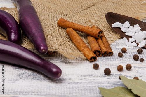 Purple chinese  eggplants and bay leafs