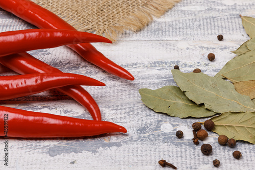 Red chili peppers and bay leafs