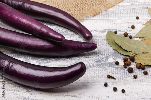 Purple chinese  eggplants and bay leafs