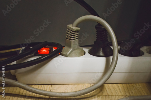 Connection in electric devices in an extension cord, close-up. photo