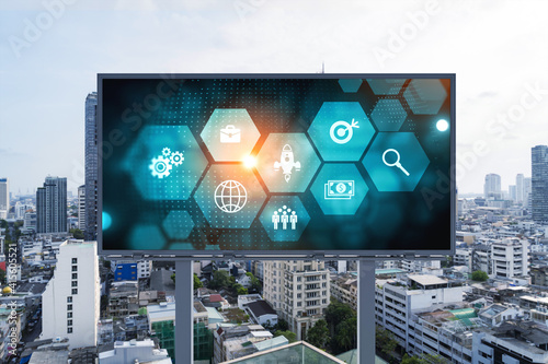 Research and development hologram on billboard over panorama city view of Bangkok. The hub of new technologies to optimize business in Southeast Asia. Concept of exceeding opportunities.