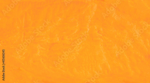 Sweet potato texture as a background. Deatailed Orange  potato wallpaper