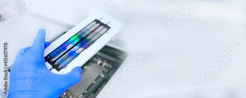 Obraz na płótnie next generation sequencing flow cell. genetic engineering, genetic modification, designer baby and cloning concept. cancer screening and medical technology and therapy. banner with copy space w salonie