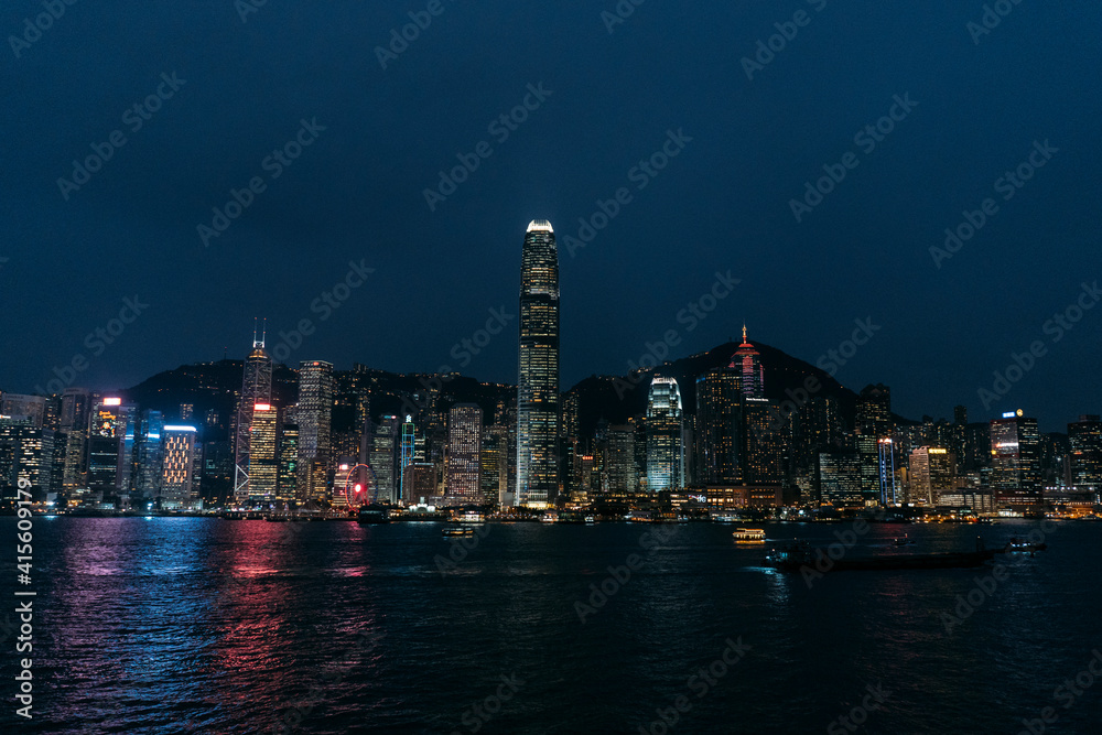 Hong Kong Island Cityscape at night from across the harbor.