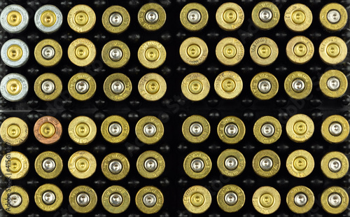 the background of pistol cartridges