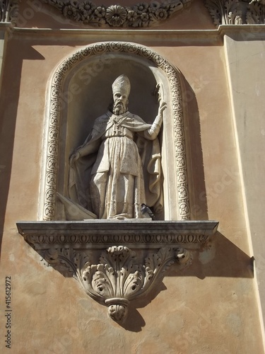 Sculpture on the facade of the Basilica St. Michel, Menton, France photo