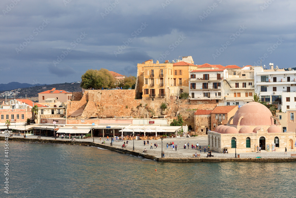 Beautiful town of Chania and its old port with the old mosque at the right, (now an arts center), a popular tourist resort in Crete, Greece, Europe
