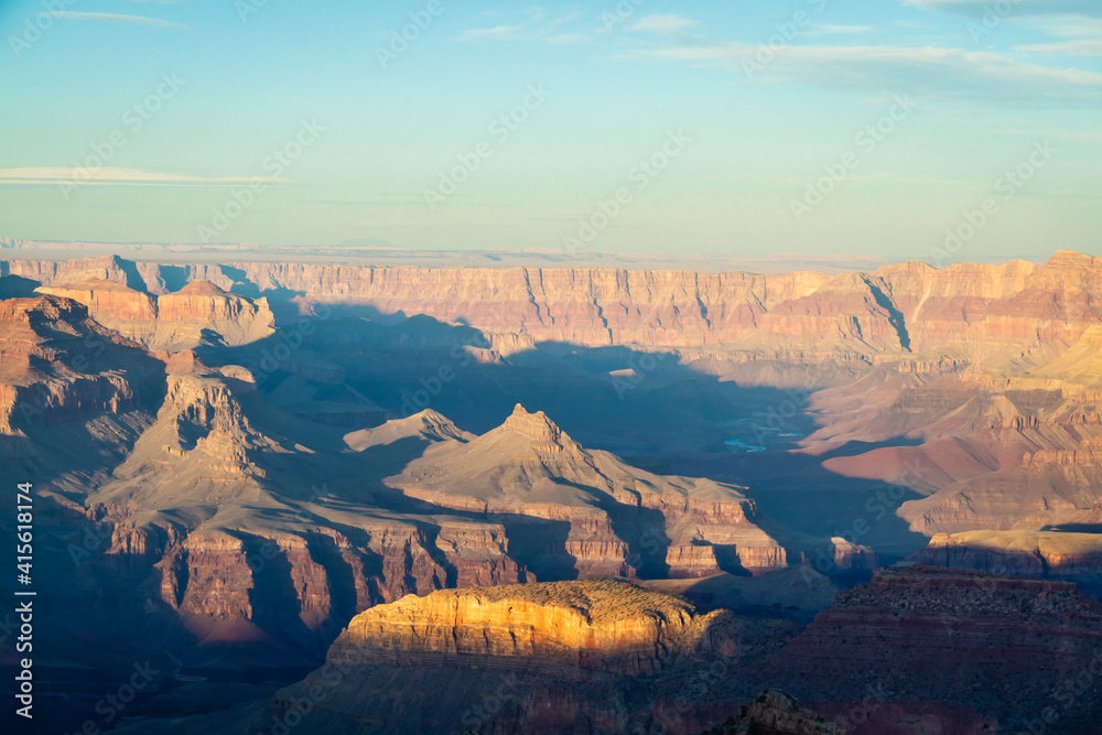 Fototapeta premium Sunset at the Grand Canyon in Arizona bathed in evening light