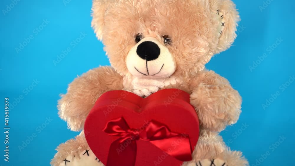 ДаНет
Close up of cute teddy bears with red gift box in form of heart. Soft plush toys with present on blue background. Concept of holidays, presents and good mood.
ДаНет
Close up of cute teddy bears with red gift box in form of heart. Soft plush toys with present on blue background. Concept of holidays, presents and good mood.