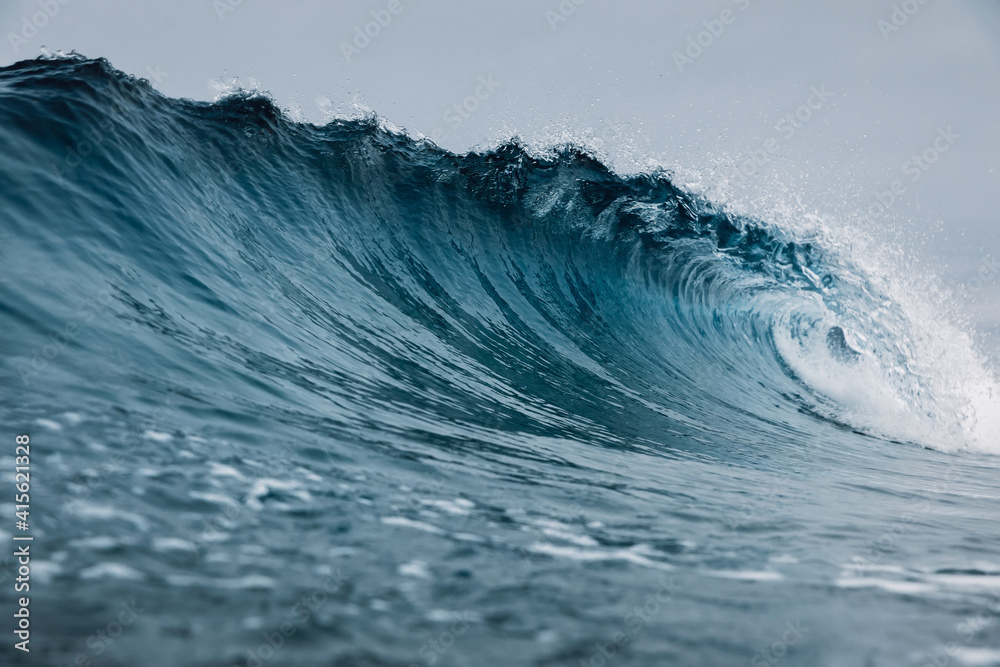 Perfect sea waves with blue water cloudy sky. Perfect sea waves with blue water cloudy sky.