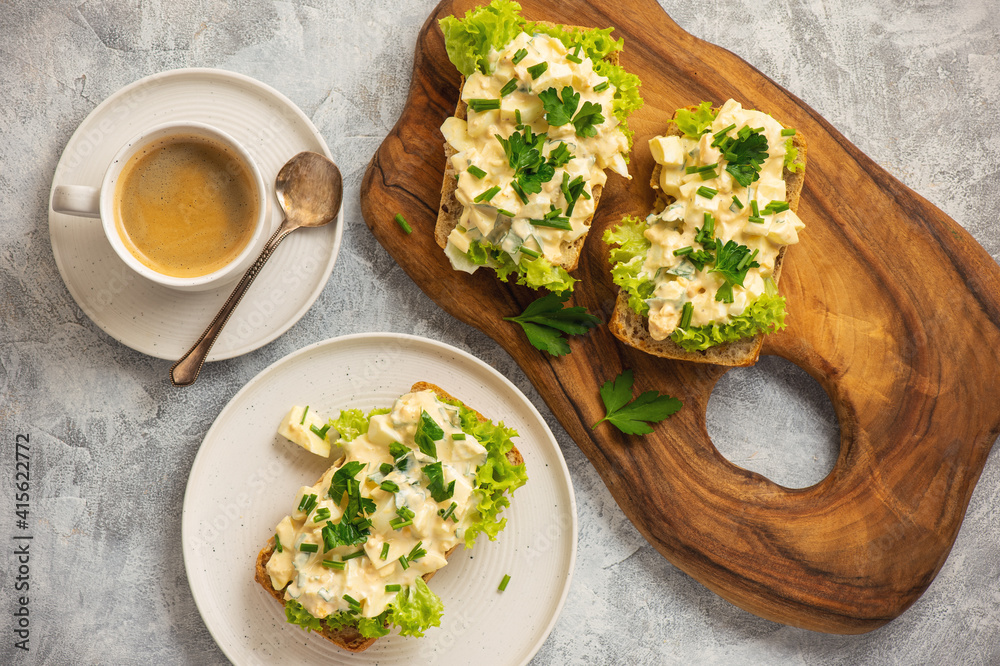 Egg salad sandwiches, on light background. Egg salad sandwiches, on light background.