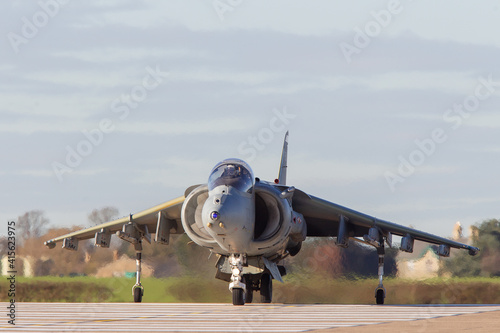 Cuadro en lienzo Harrier Jump Jet taxis towards the camera crossing the runway