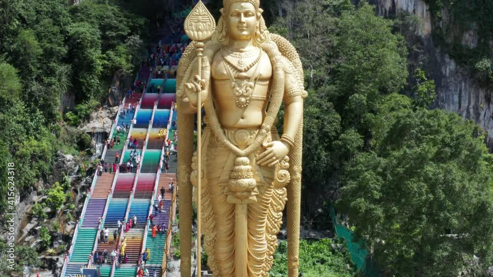Flight over scenic Lord Murugan Statue  (Batu caves)