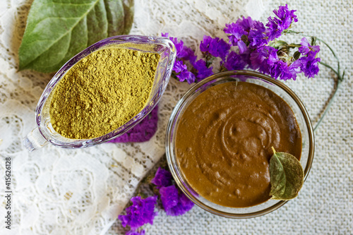 Prepare the henna paste at home. Focus on the powder.