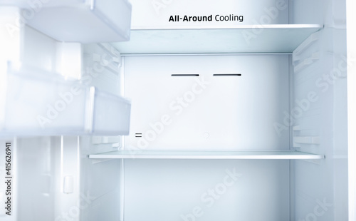 Real photo New white empty refrigerator, storage shelves, kitchen appliances. Isolated