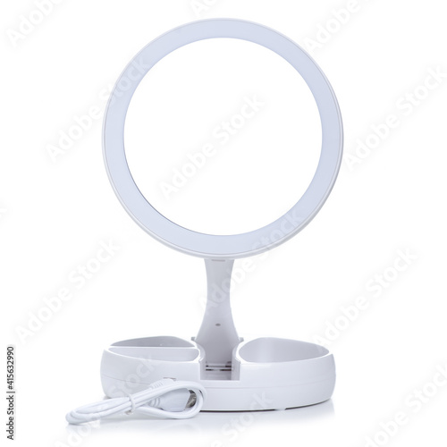 cosmetic mirror with light on white background isolation